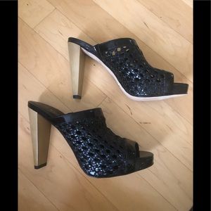 Cole Haan Black Leather and patent heels with Nike Air soles. Size 10. New!